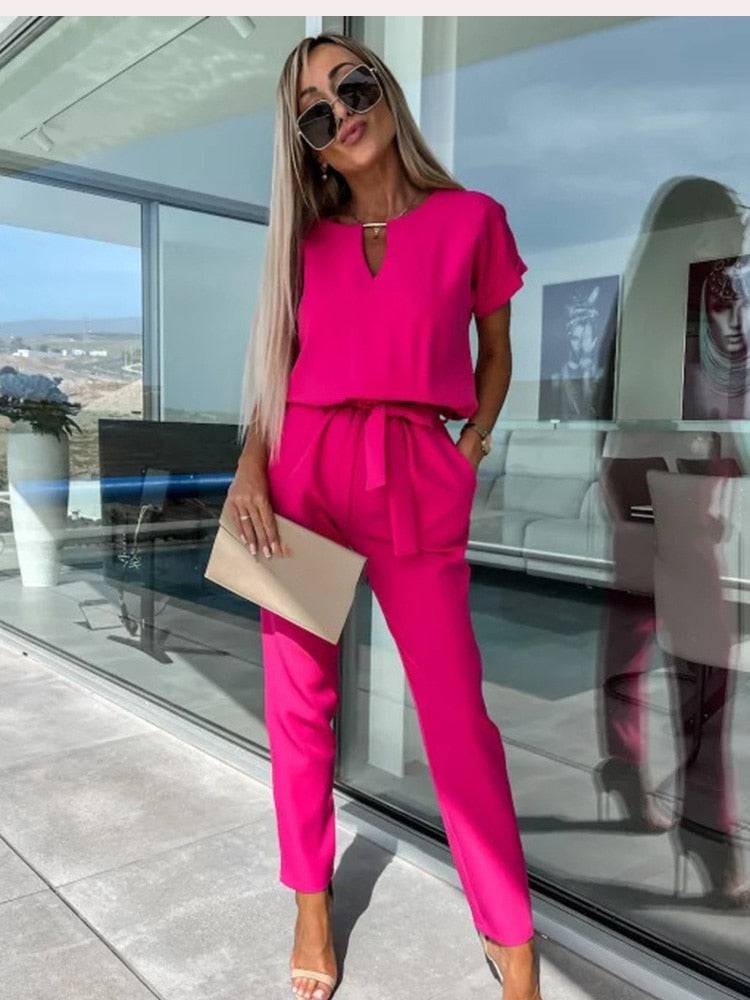 Noor - Stijlvolle slim leg jumpsuit met centuur en korte mouwen - Felesty