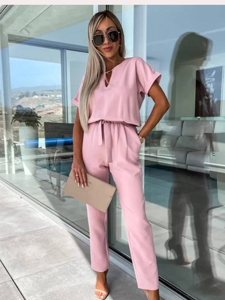 Noor - Stijlvolle slim leg jumpsuit met centuur en korte mouwen - Felesty